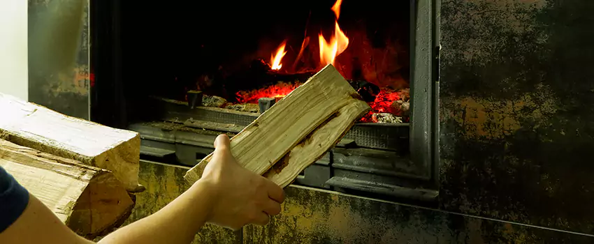 Wood Stove Heat Resistant Wall Repair in Brossard, Quebec